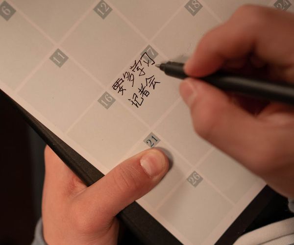 Calendar with marked regular dates for exercise.